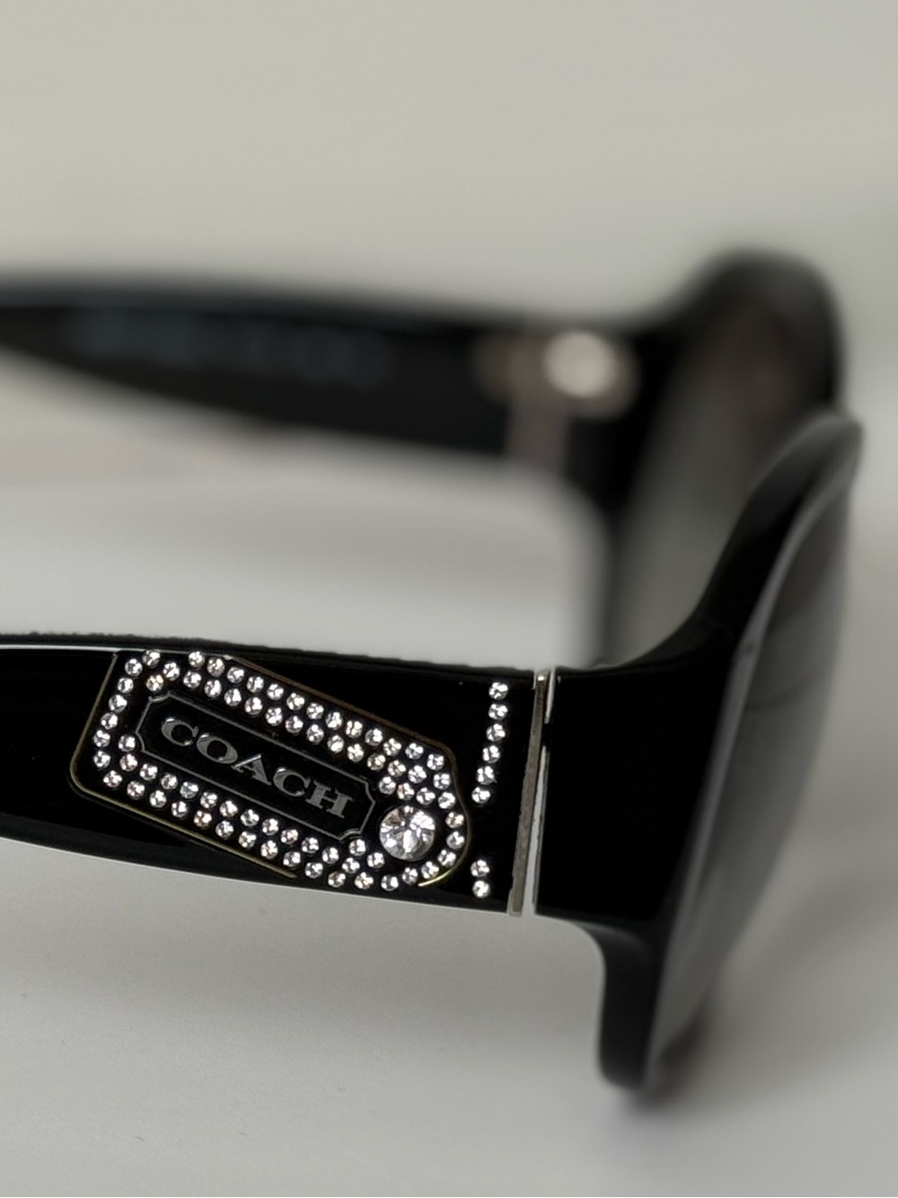 Coach Black Sunglasses with Crystal-Studded Logo Buckle